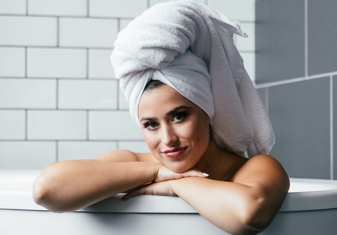 Woman In Bath With Towel On Head